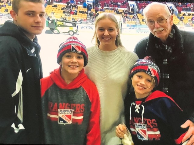 Barry and his grandkids at at Kitchener Rangers game